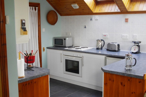 well equipped kitchen in this comfortable
                        and quiet holiday apartment